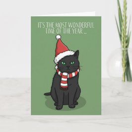 サンタの帽子をかぶったおもしろいおこりんぼ猫のメリークリスマス シーズンカード