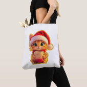 **サンタの帽子をかぶったかわいいクリスマス猫 – 面白いホリデー トートバッグ (クローズアップ)