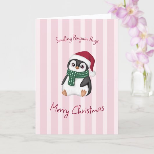 サンタの帽子をかぶったかわいいベビーペンギンのクリスマス カード (蘭)