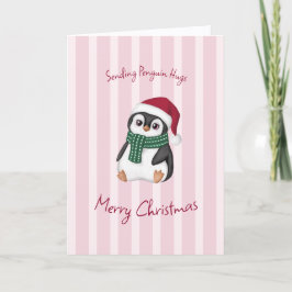 サンタの帽子をかぶったかわいいベビーペンギンのクリスマス カード