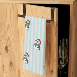 サンタの帽子をかぶったかわいいベビーペンギンのクリスマス キッチンタオル
