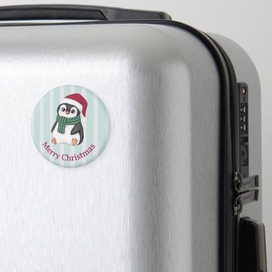サンタの帽子をかぶったかわいいベビーペンギンのクリスマス マグネット (インサイチュ (スーツケース))