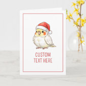 サンタの帽子をかぶったオカメインコのクリスマスグッズ カード (黄色い花)
