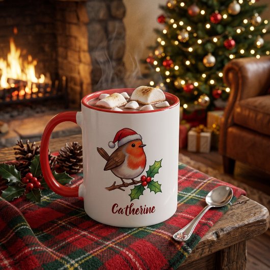 サンタの帽子をかぶったクリスマスのコマドリの名入れグッズ マグカップ