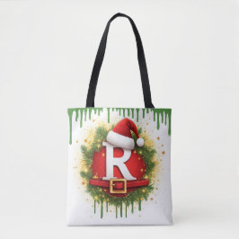 サンタの帽子をかぶったクリスマスの文字R 冬のギフト トートバッグ