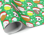 サンタの帽子をかぶったスポーツボールのクリスマスグリーン ラッピングペーパー (ロールコーナー)