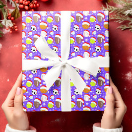 サンタの帽子をかぶったスポーツボール クリスマスパープル ラッピングペーパー