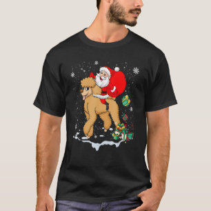サンタの帽子をかぶったプードル犬 クリスマスパーティー Tシャツ