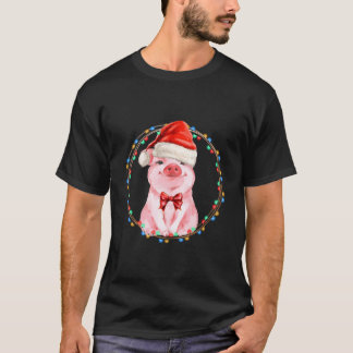 サンタの帽子をかぶった可愛い豚 Tシャツ