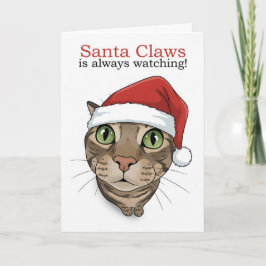 サンタの帽子をかぶった面白いネコのクリスマス シーズンカード
