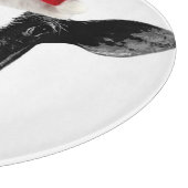 サンタの帽子を持つかわいいクリスマス牛 カッティングボード (角)