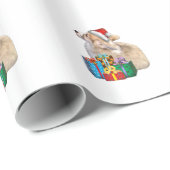 サンタの帽子を持つウェルシュコーギーの子犬 ラッピングペーパー (ロールコーナー)