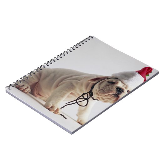 サンタの帽子を身に着けているブルドッグの子犬 ノートブック (左側)