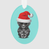 サンタの帽子を身に着けているベビーのゴリラ オーナメント (正面)