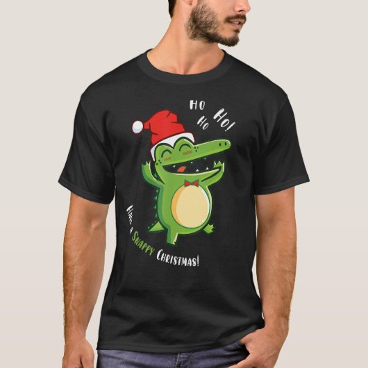 サンタの帽子クリスマスクロコダイルのかわいいアリゲーター Tシャツ (正面)