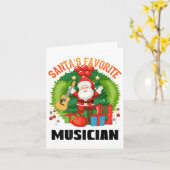 サンタの愛するギタリスト、クリスマスギター奏者 カード (黄色い花)