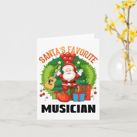 サンタの愛するギタリスト、クリスマスギター奏者 カード (黄色い花)