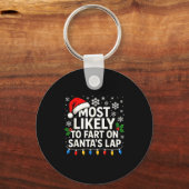 サンタの膝の上でおならをする可能性大 楽しい家族のクリスマスTシャツ キーホルダー (正面)