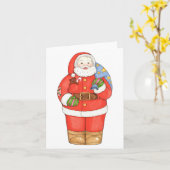 サンタの袋を背負ったクリスマス カード (黄色い花)