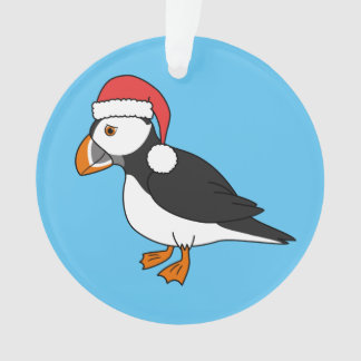 サンタの赤い帽子を持つクリスマスのツノメドリ オーナメント