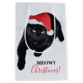 サンタの赤い帽子を持つ猫 ミディアムペーパーバッグ (正面)