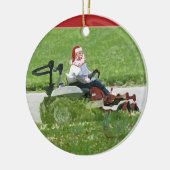 サンタは乗用芝刈り機のランドスキャパーに乗っている セラミックオーナメント (左)