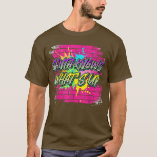 サンタは何がグラフィックスなのかおもしろい知っている Tシャツ