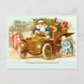 サンタは天使の車遊に乗る。クリスマス ポストカード (正面)