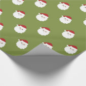 サンタは緑のクリスマスの包装紙で直面します ラッピングペーパー (角)