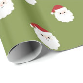 サンタは緑のクリスマスの包装紙で直面します ラッピングペーパー (ロールコーナー)