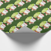 サンタをサーフするお祝いのクリスマスはパーティーの覆いをタイルを張りました ラッピングペーパー (角)