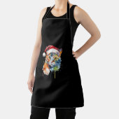 サンタカラフルハットの子ネコが醜いクリスマスを着る エプロン (インサイチュ)