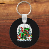 サンタギニアが乗るT-Rexノームのクリスマスツリー キーホルダー (正面)