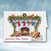 サンタクリスマス暖炉でプードル子犬が待っている