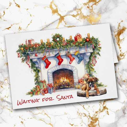 サンタクリスマス暖炉でボクサーの子犬が待つ