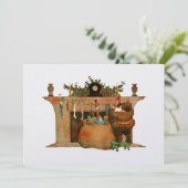 サンタクロースおもちゃでストッキングを詰め込むクリスマス シーズンカード (スタンド正面)