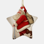 サンタクロースおよび押しのスクーター セラミックオーナメント (右)