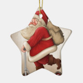 サンタクロースおよび押しのスクーター セラミックオーナメント (左)