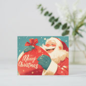 サンタクロースがクリスマスプレゼントを用意 ポストカード (スタンド正面)