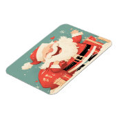 サンタクロースがクリスマスプレゼントを用意 マグネット (左側)