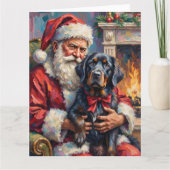 サンタクロースがニューファンドランドを抱えるクリスマスアート カード (正面)