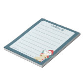 サンタクロースがリストブルーホリデーのメモ帳をチェック ノートパッド (回転)