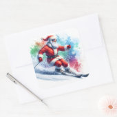 サンタクロースが冬の雪の斜面を滑り降りる スクエアシール (封筒)