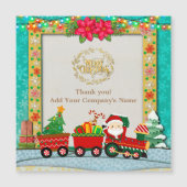 サンタクロースが列車の中でプレゼントとクリスマスツリーを (正面)