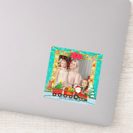 サンタクロースが列車の中でプレゼントとクリスマスツリーを シール