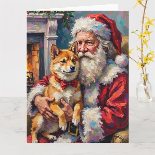サンタクロースが柴犬を抱っこしているクリスマスアート カード (黄色い花)