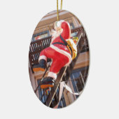 サンタクロースが火の手を逃れる セラミックオーナメント (左)