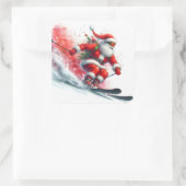 サンタクロースが雪の多い山を滑り降りる スクエアシール (バッグ)