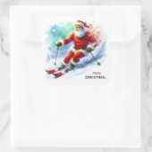 サンタクロースが雪の多い山を滑り降りる スクエアシール (バッグ)