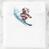 サンタクロースが雪の多い山を滑り降りる スクエアシール (バッグ)